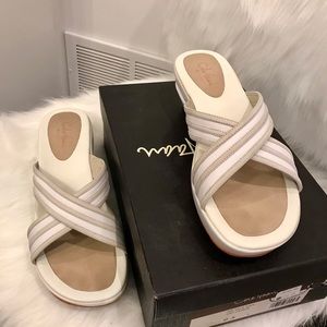 Come Haan Air Vela Slides